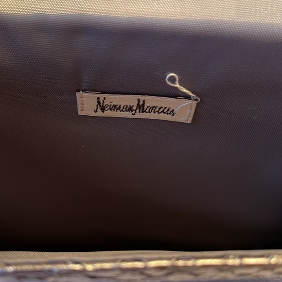 Neiman Marcus wristlet. Silver. Shine pulls bronze or gray depending. 9.5”x5.5” - Picture 6 of 8